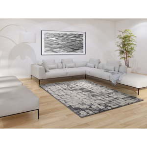 Šedý koberec vhodný i na ven Universal Adra Grisso, 57 x 110 cm